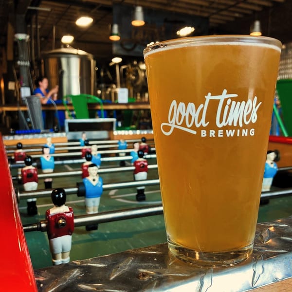 A pint of Good Times Brewing beer on a foosball table at The Mill House.
